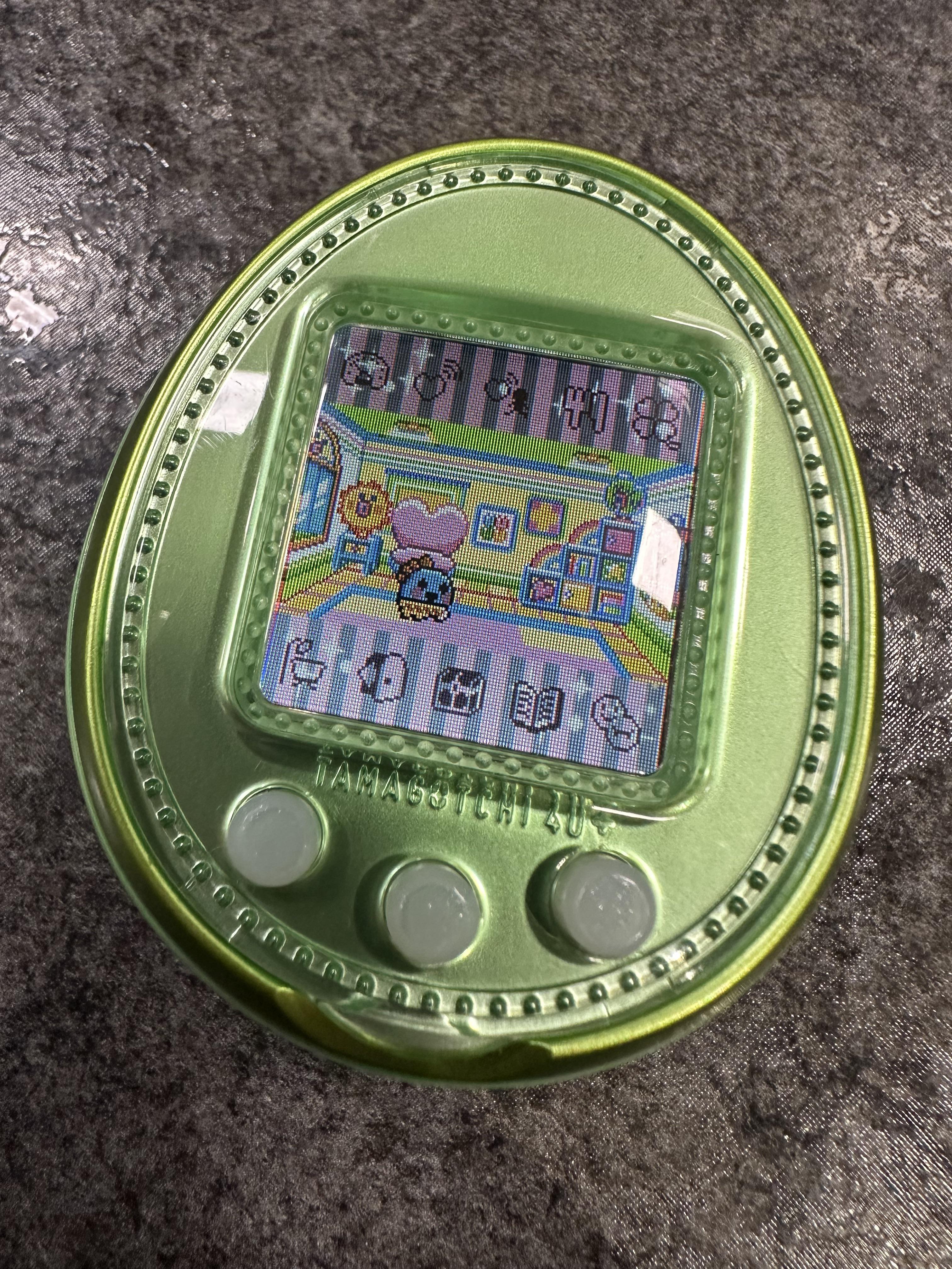 one of my grail tamagotchis arrived today! the green 4u+ : r