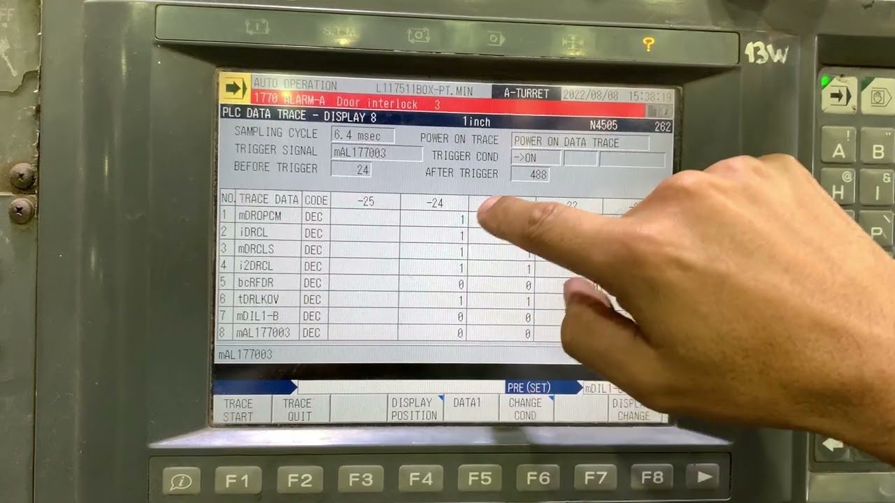 Okuma LOC-650 with OSP-E100L: “1770 ALARM-A Door interlock 3