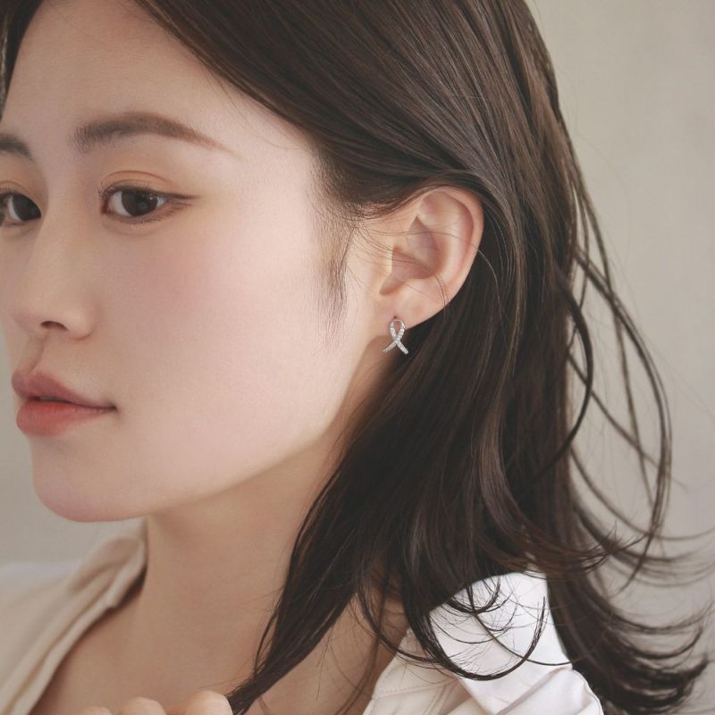 ピアス ニッケルフリー キュービックジルコニア ロール クロス リボン