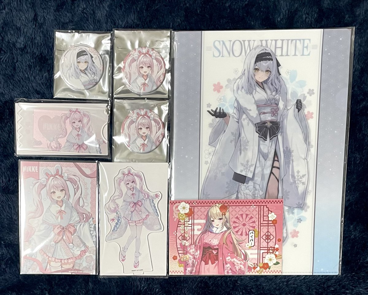 NIKKE友さんから 春探しの旅グッズ届いたぁ♥️ 缶バッジも2つアリスで